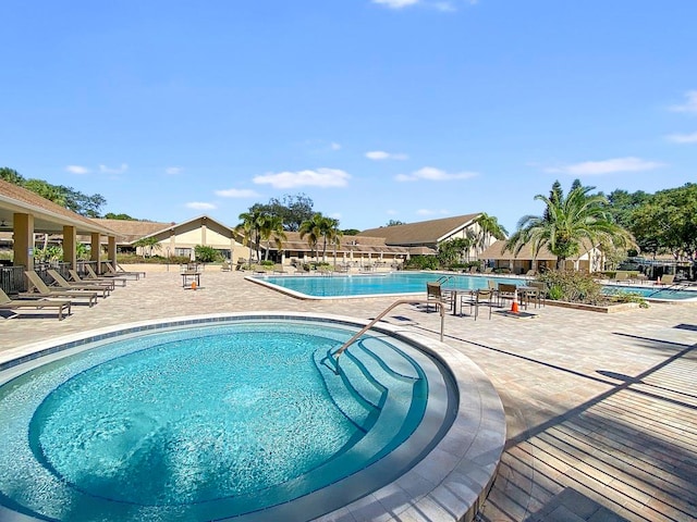 view of pool featuring a patio area