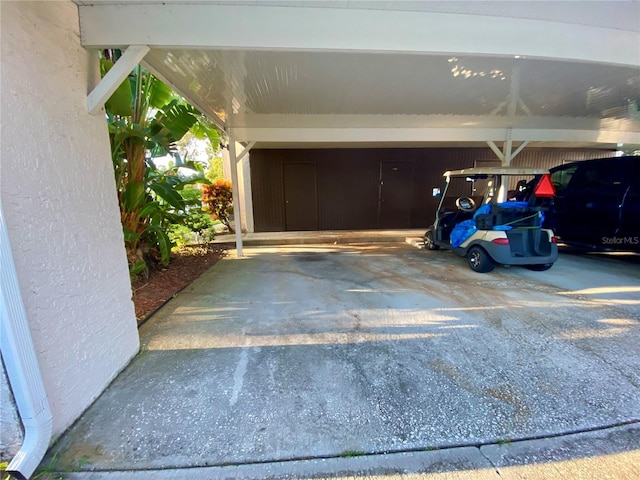 garage featuring a carport