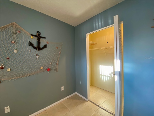 interior space featuring light tile patterned flooring