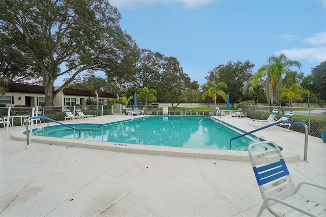 view of pool with a patio