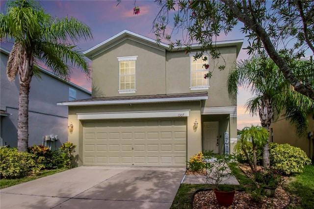 view of front of property featuring a garage