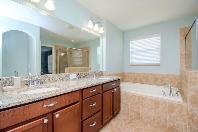 bathroom with vanity, plus walk in shower, and tile patterned flooring