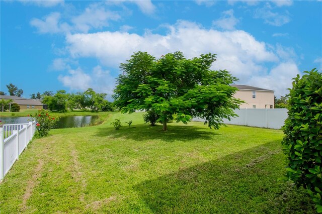 view of yard with a water view