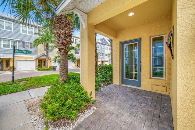 property entrance featuring a garage