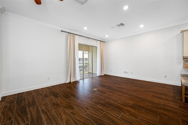 unfurnished room with dark wood-type flooring, ceiling fan, and crown molding