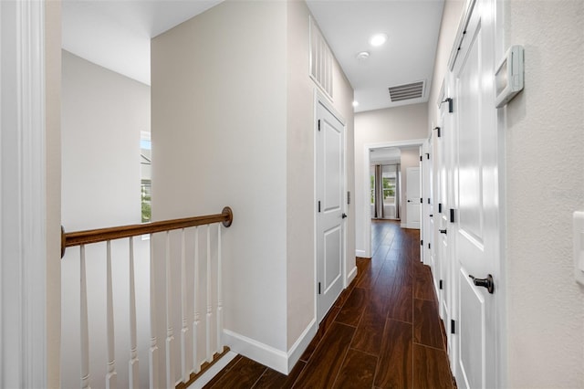 hallway featuring dark wood-type flooring