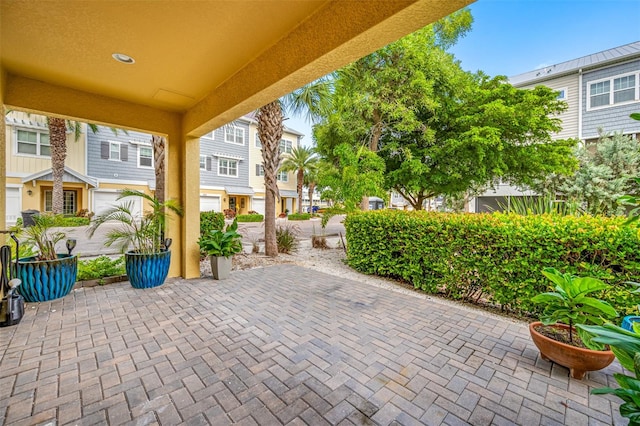 view of patio / terrace with a garage