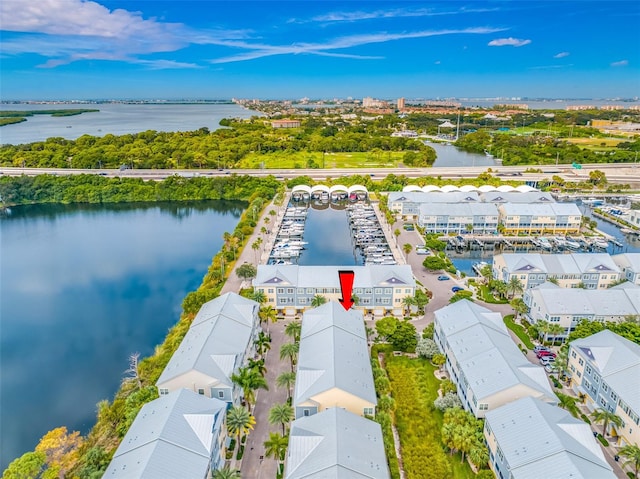 birds eye view of property featuring a water view