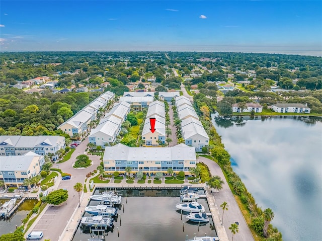 birds eye view of property featuring a water view