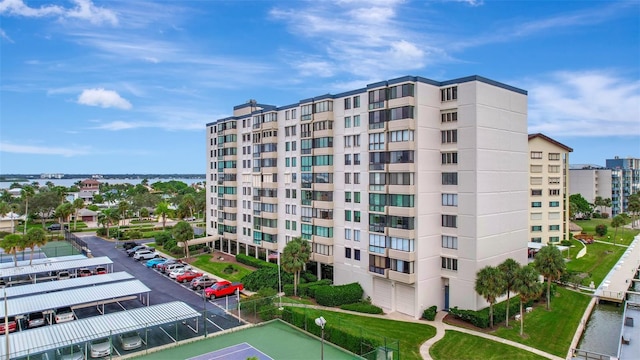 view of building exterior with a water view