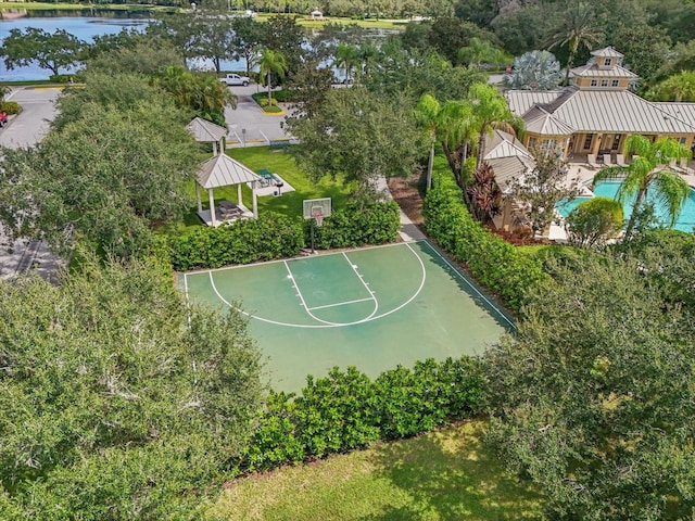 view of basketball court with a water view and a gazebo