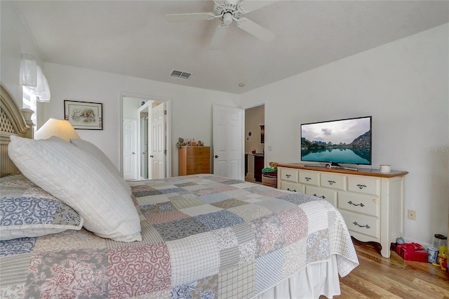 bedroom with ceiling fan and light wood-type flooring