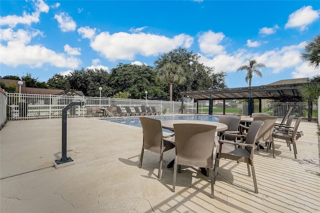 view of patio featuring a community pool