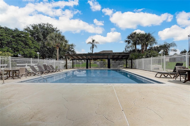 view of pool featuring a patio and a pergola