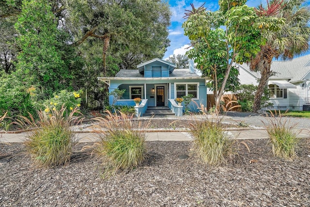 2111 Burlington Ave N, Saint Petersburg, FL 33713 - bungalow featuring a porch and fence