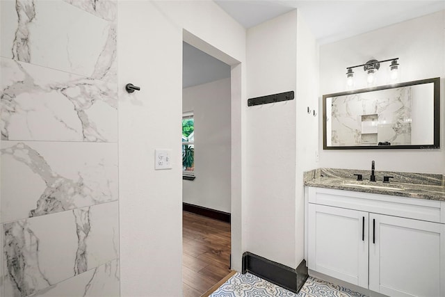 2111 Burlington Ave N, Saint Petersburg, FL 33713 - full bath featuring vanity and wood finished floors