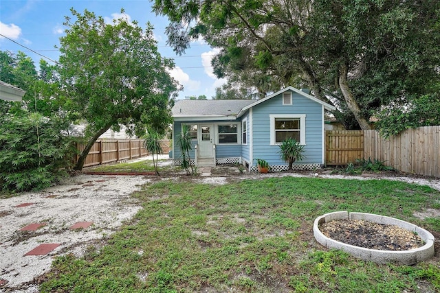 view of front of home with a front yard