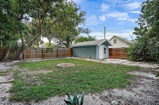 2111 Burlington Ave N, Saint Petersburg, FL 33713 - view of yard featuring an outbuilding, a fenced backyard, and a shed
