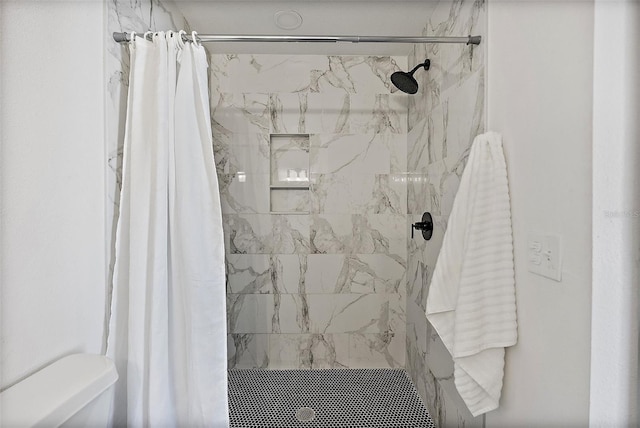 bathroom featuring curtained shower