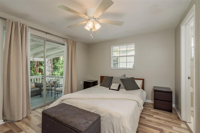 bedroom with light wood-type flooring, access to exterior, baseboards, and a ceiling fan
