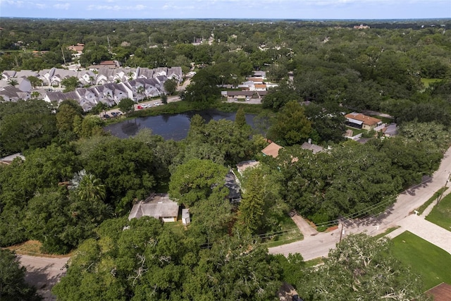 bird's eye view featuring a forest view and a residential view