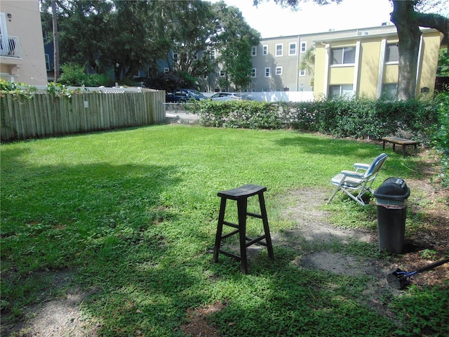 view of yard with fence