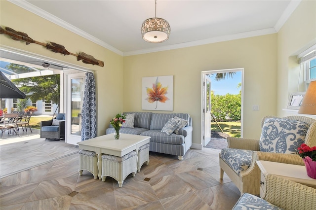 living room with crown molding and a wealth of natural light