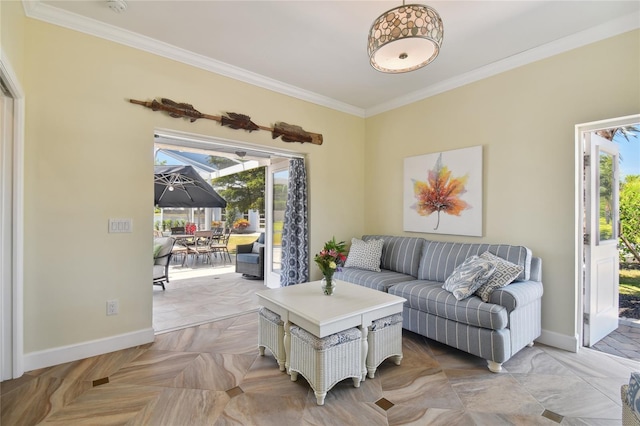 living room featuring crown molding and a healthy amount of sunlight