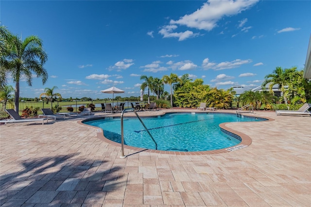 view of pool featuring a patio area