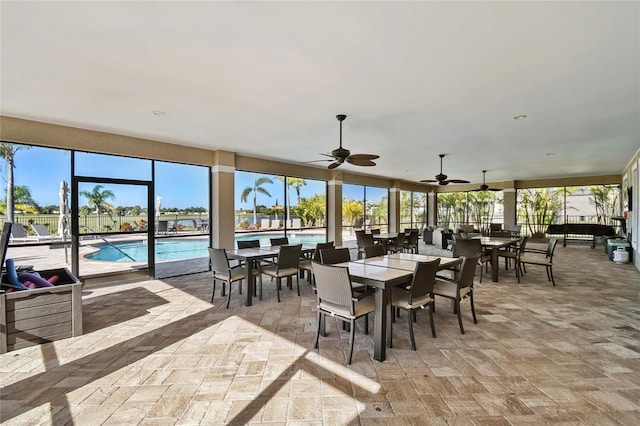 dining room featuring ceiling fan