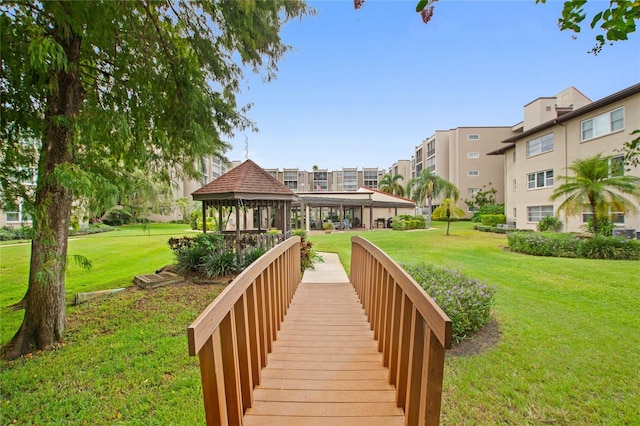 view of home's community featuring a yard