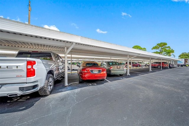 view of parking featuring a carport