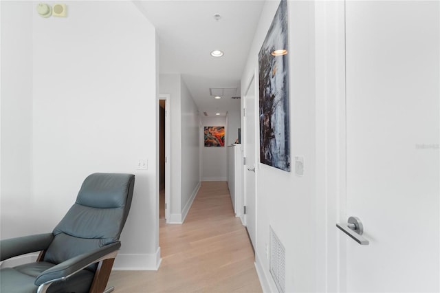 hallway featuring light wood-type flooring