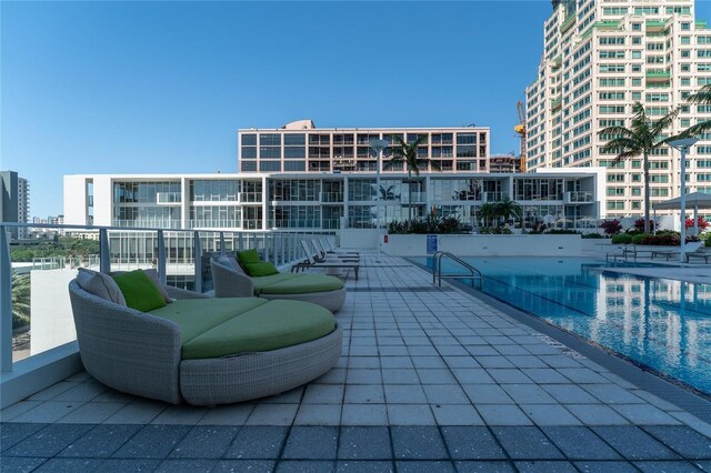 view of patio with a community pool