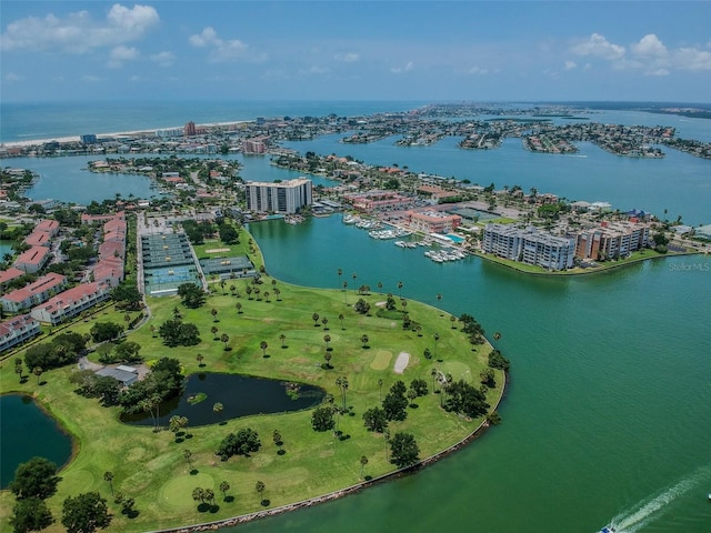 bird's eye view featuring a water view, view of golf course, and a city view