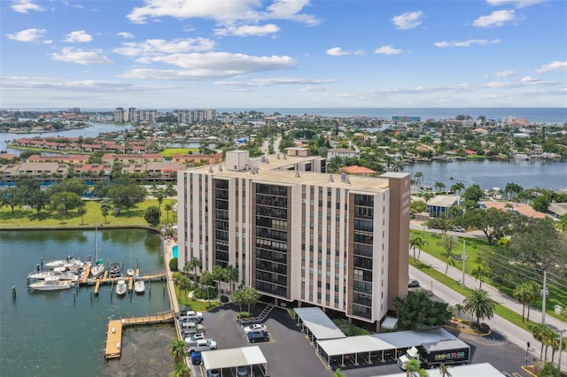 drone / aerial view with a view of city and a water view