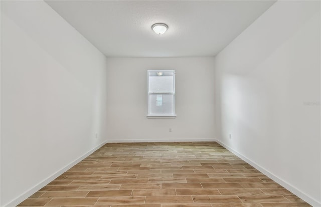 spare room featuring a textured ceiling