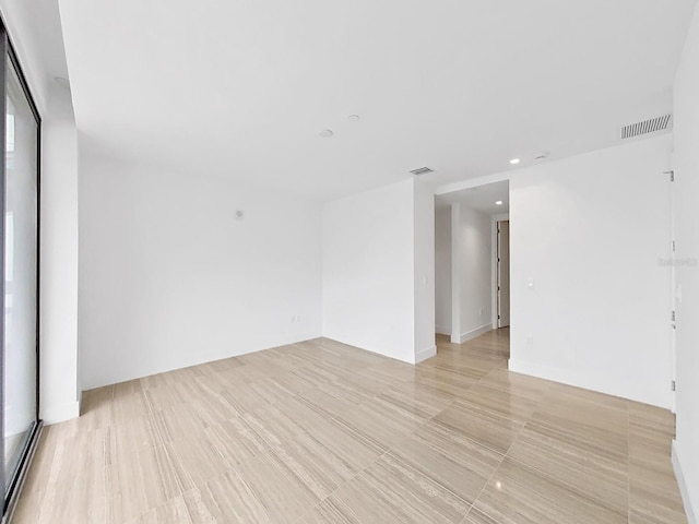 empty room with light wood-type flooring