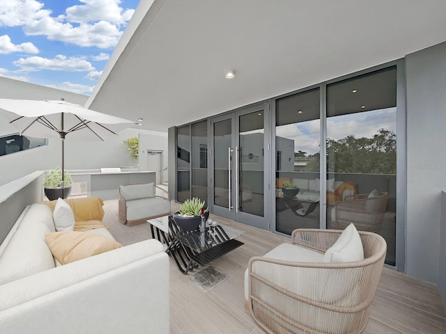 exterior space featuring outdoor lounge area and french doors