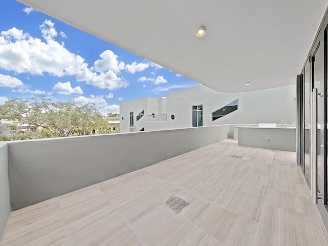 view of patio / terrace with a balcony