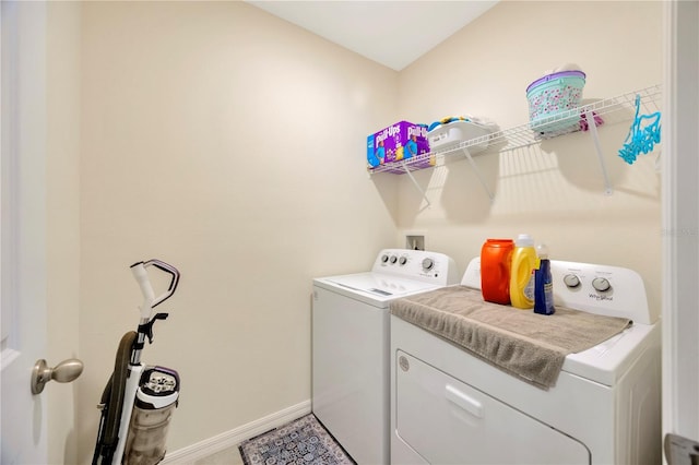 laundry room with independent washer and dryer