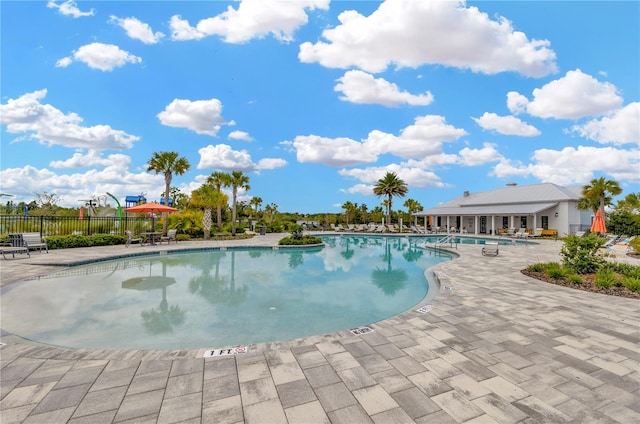 view of pool featuring a patio area