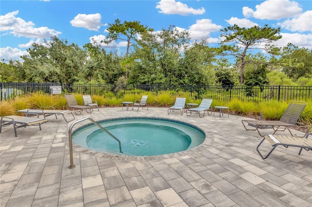 view of pool featuring a patio area