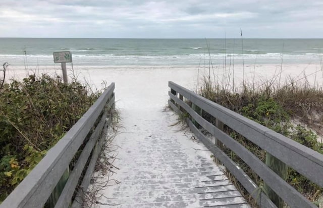 view of water feature with a beach view