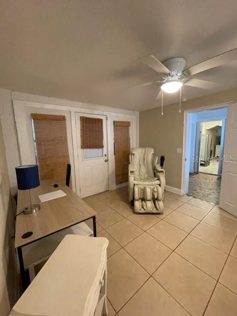 tiled office with ceiling fan