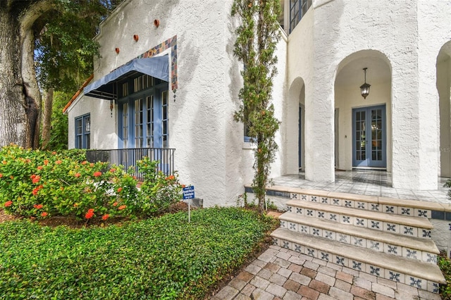 doorway to property featuring french doors