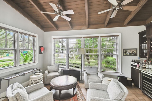 living room with wine cooler, light tile patterned floors, ceiling fan, vaulted ceiling with beams, and wood ceiling