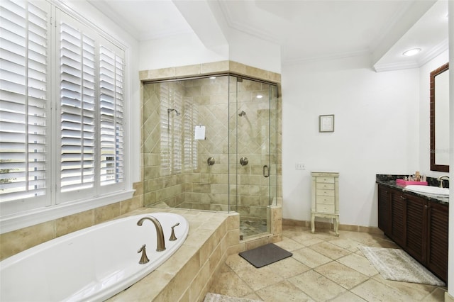 bathroom featuring plus walk in shower, crown molding, and vanity