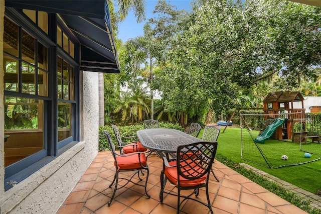 view of patio featuring a playground