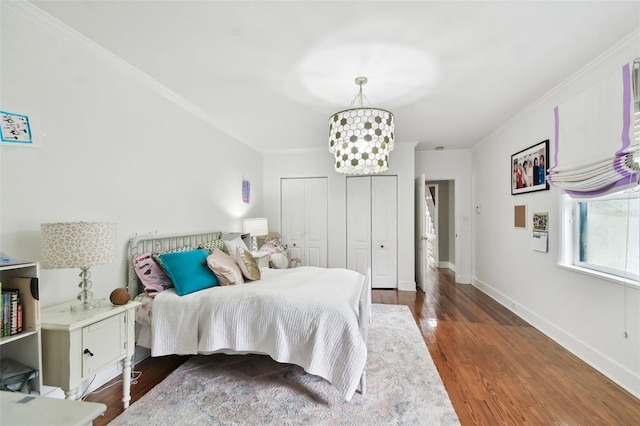 bedroom with crown molding and dark wood-type flooring